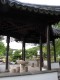 A_pavilion_in_the_Bonsai_Garden_furnished_with_stone_tables_and_stools.jpg