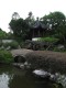 A_view_of_the_pavilion_on_a_hill_top_and_the_lake_in_the_Bonsai_Garden.jpg