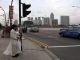 A_bride_and_groom_waiting_for_the_lights_at_a_pedestrian_crossing_on_Esplanada_Drive_Road.jpg