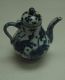A_blue-and-white_ewer_with_Buddhist-lion_design_made_in_the_Ming_Dynasty_during_the_reign_of_Xuande.jpg