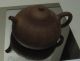 A_low_chamfered_teapot_from_the_reign_of_Jiaqing_and_gourd_shaped_teapot_from_the_early_19th_century_2.jpg