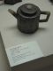 A_teapot_encased_in_pewter_in_flower_shape_from_the_Qing_Dynasty_in_the_reign_of_Daoguang.jpg