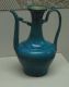 A_turquoise-glazed_porcelain_ewer_made_in_the_second_half_of_the_16th_century_during_the_Ming_Dynasty_2.jpg
