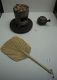 The_fan_and_charcoal_burner_with_water_pot_are_essential_items_in_the_preparation_of_Gongfu_tea.jpg