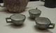 Three_teacups_encased_in_pewter_with_inscription_by_Suchuan_from_the_Qing_Dynasty_during_the_19th_century.jpg