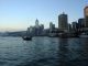 A_sampan_sails_out_into_Victoria_Harbour_as_the_Star_Ferry_waits_for_remaining_passengers.jpg