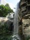 A_view_of_the_water_cascading_down_from_the_waterfall_in_Hong_Kong_Park.jpg