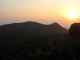 The_sun_and_hills_of_Lantau_at_evening_as_viewed_from_the_Tian_Tan_Buddha.jpg
