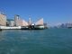 View_of_Tsim_Sha_Tsui_Star_Ferry_Pier_aboard_a_Star_Ferry_as_it_heads_towards_Central.jpg