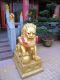 The_male_guard_lion_with_globe_on_the_left-hand_side_of_the_main_temple_at_The_Ten_Thousand_Buddhas_Monastery.jpg